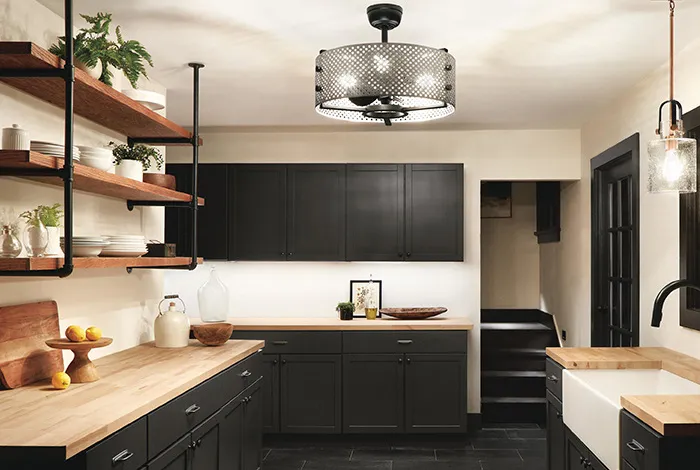 Shaker-style kitchen in charcoal with butcher-block worktops, a farmhouse sink and open timber shelving